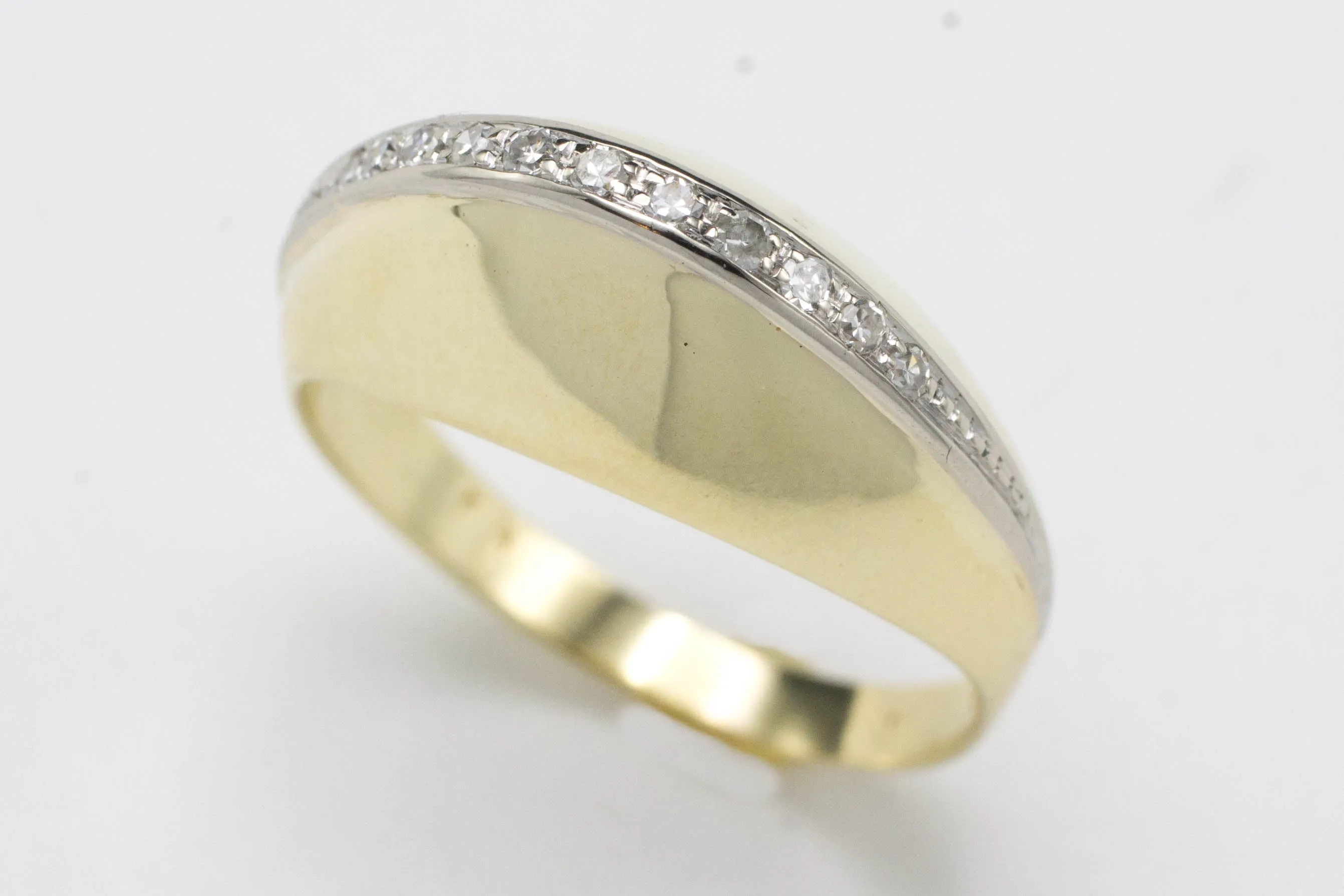 Arch style ring with half cut diamonds in 14 carat gold