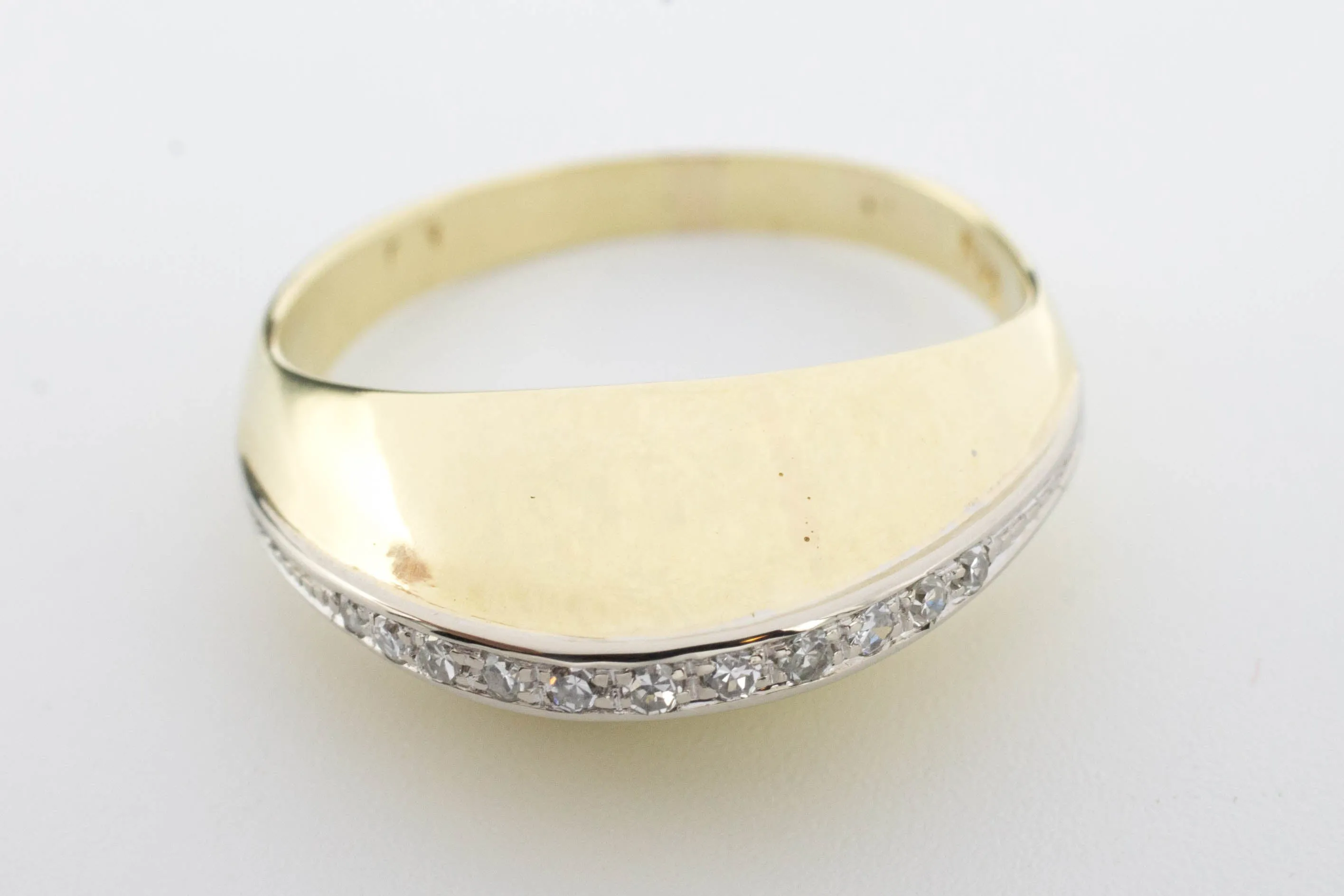 Arch style ring with half cut diamonds in 14 carat gold