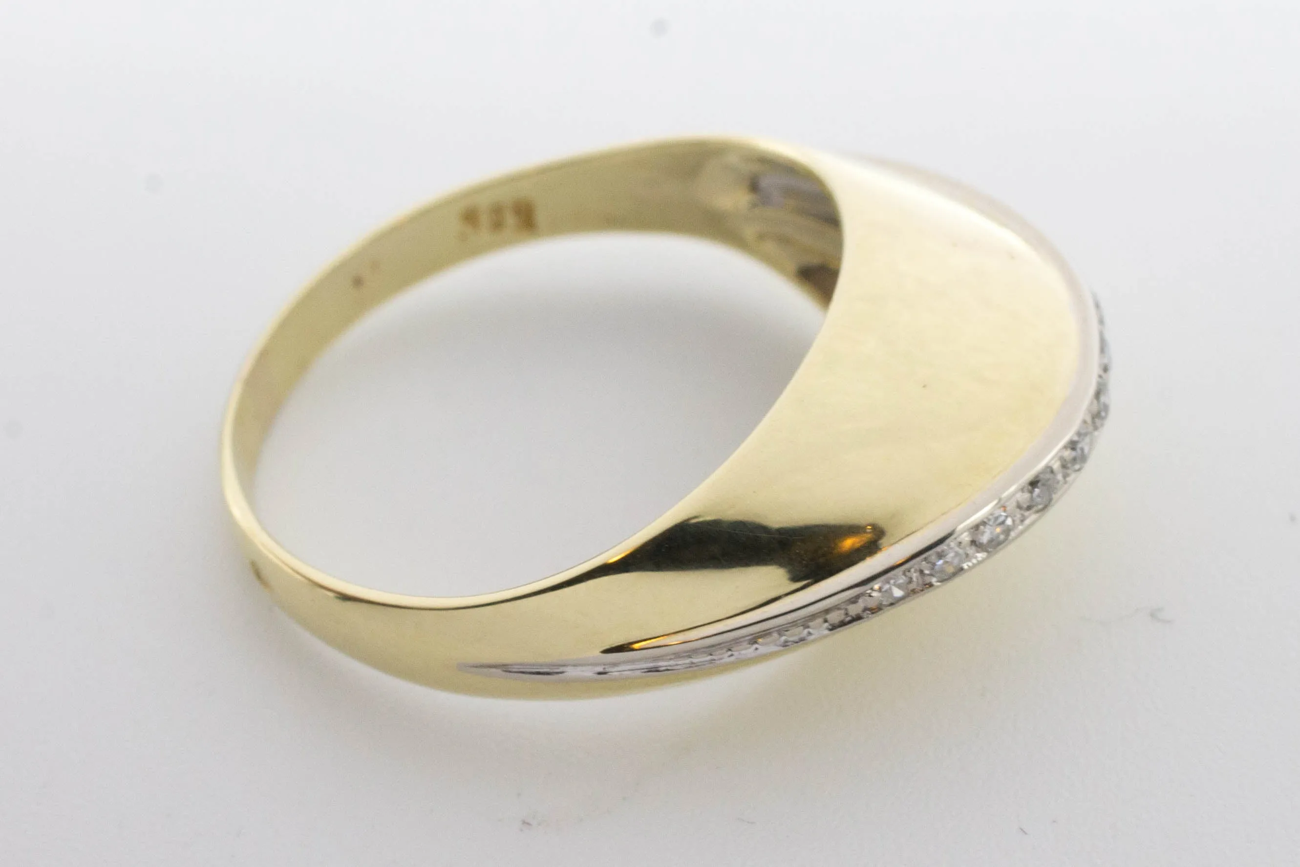 Arch style ring with half cut diamonds in 14 carat gold